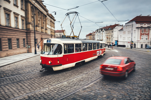 Moving red tram in Prague, Czech Republic.
