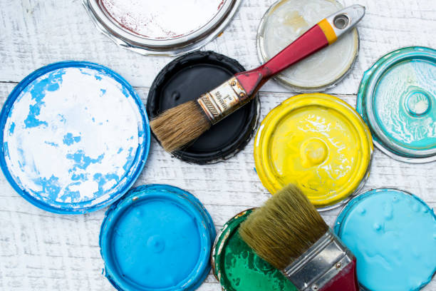 istock lids from cans of paint. 925429378