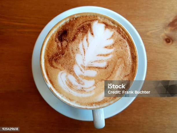 Drinking A Hot Cup Of Coffee With Milk Latte And Foam Mug At Breakfast Stock Photo - Download Image Now