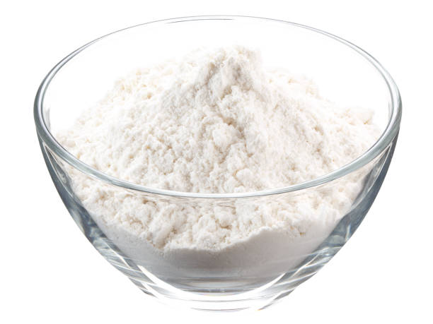 istock flour in glass container isolated on white background 925435988