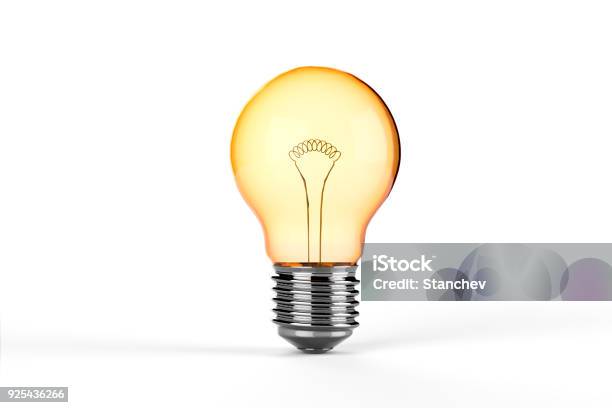 Yellow Incandescent Light Bulb Isolated Stock Photo - Download Image Now - Light Bulb, Cut Out, White Background