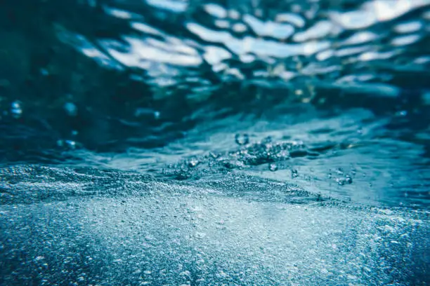 Underwater splash with bubbles.