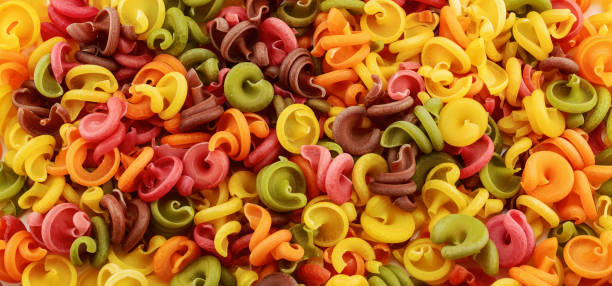 istock Dry italian pasta in five colours 925443872