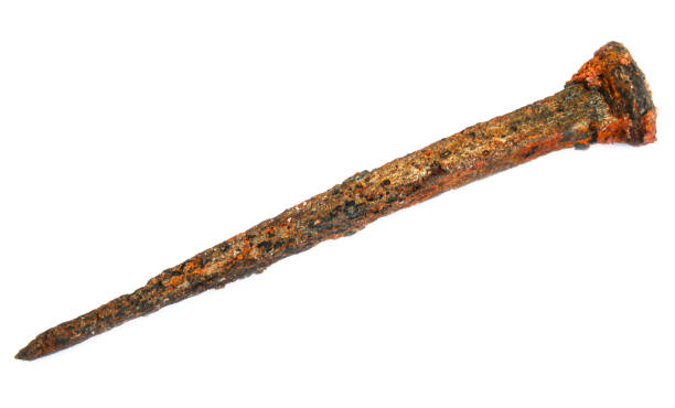 Old rusty nail Old iron rusty nail closeup on white rusty nails stock pictures, royalty-free photos & images
