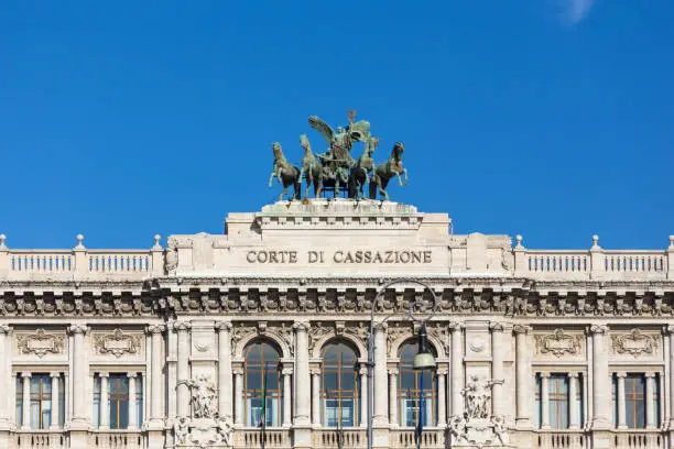 Photo of italian supreme court of cassation by day with blue sky