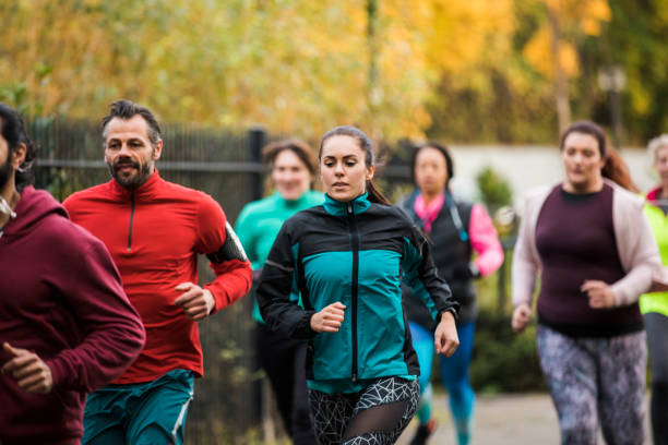 istock Group Of Friends Running Together a 925447400