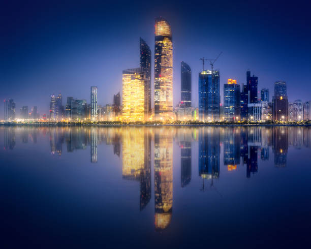 istock Panorama view of Abu Dhabi Skyline at sunset, UAE 925450600
