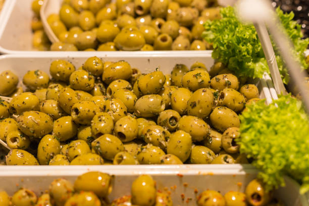 istock Mediterranean olives and olive paste on a street market 925462104