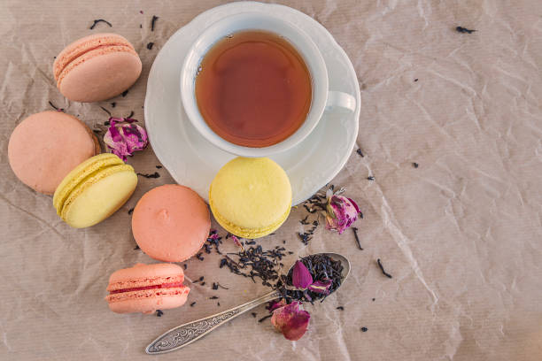 istock French macaroons, dry tea with rose flowers 925465808