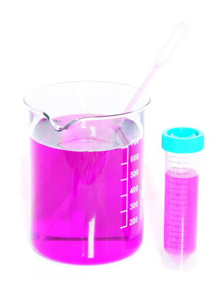 istock Chemical beaker with permanganate dissolved in water and pipette 925465868