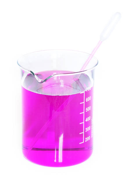 istock Chemical beaker with permanganate dissolved in water and pipette 925470118