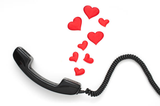 istock retro telephone handset with hearts isolated on white 925470182