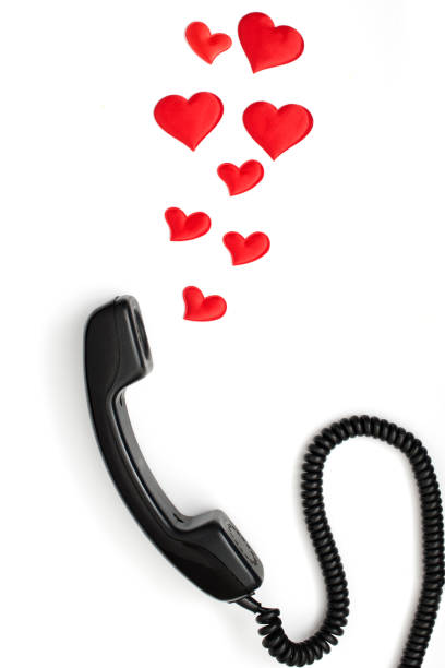 istock retro telephone handset with hearts isolated on white 925470212
