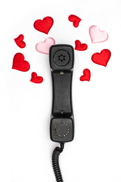 istock retro telephone handset with hearts isolated on white 925470230