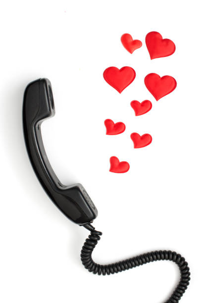 istock retro telephone handset with hearts isolated on white 925470420