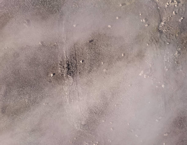 istock Plumes of smoke over concrete floor 925476134
