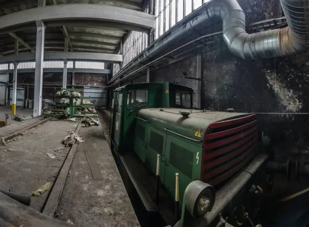 abandoned paper factory with railcar panorama view