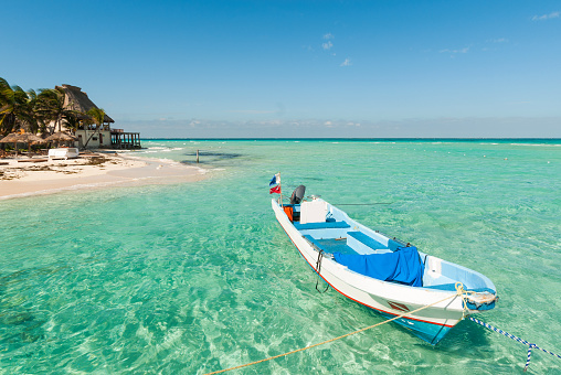 Isla Mujeres, Mexico - July 2022: Leisure craft near Playa Norte on Isla Mujeres, Mexico