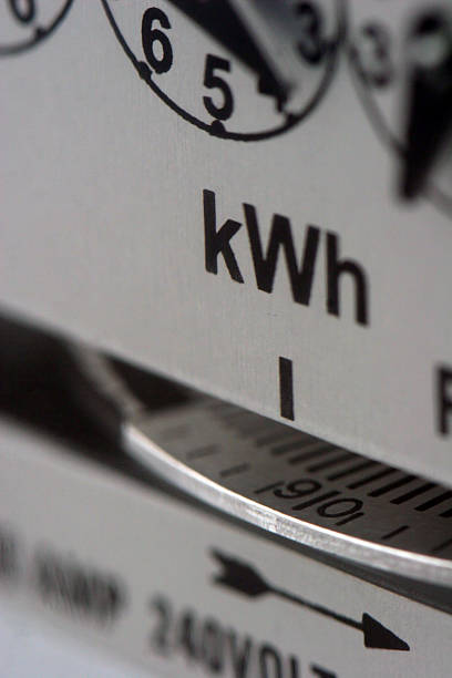 A close-up of an electric meter Macro shot of my hydro electric meter on my house kilowatt stock pictures, royalty-free photos & images