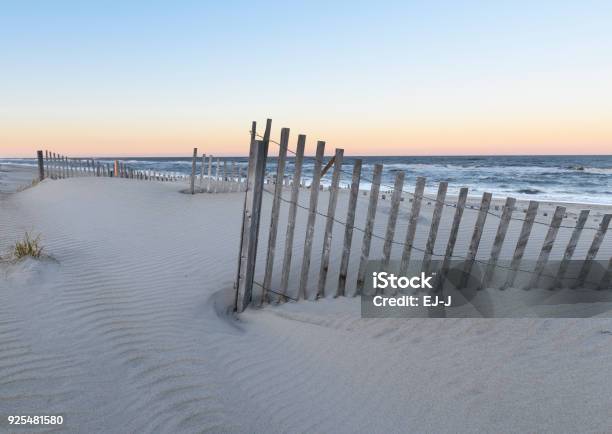 Beach Dune Fences At Sunset Stock Photo - Download Image Now - North Carolina - US State, Sunset, Sand Dune