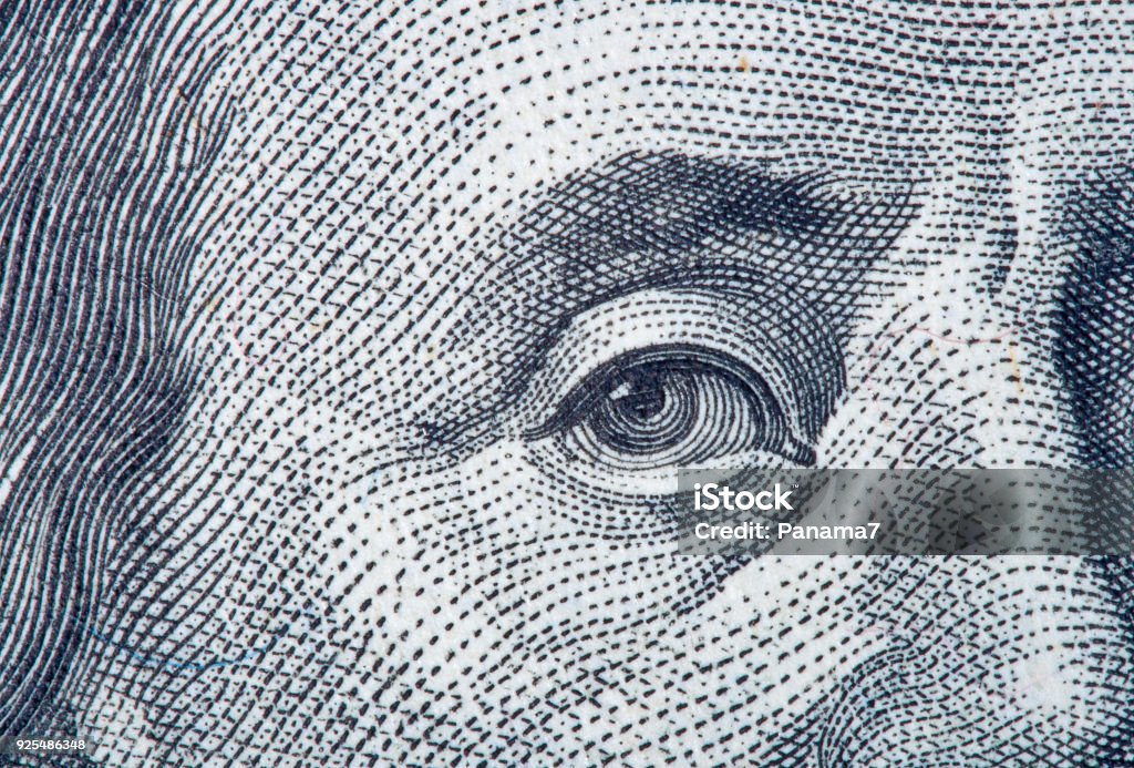 Portrait fragment of Benjamin Franklin Portrait fragment of Benjamin Franklin close-up from one hundred dollars bill Currency Stock Photo