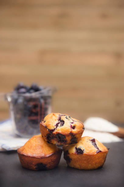 istock Homemade Blueberry Muffins on a Slate Board 925486422