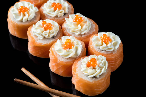 set of sushi rolls of fresh fish salmon trout  with cheese phila - phila imagens e fotografias de stock