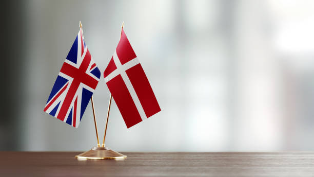 istock British And Danish Flag Pair On A Desk Over Defocused Background 925493712