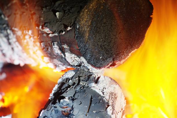 istock Detail view into fireplace ember wood.  Glowing embers 925501442