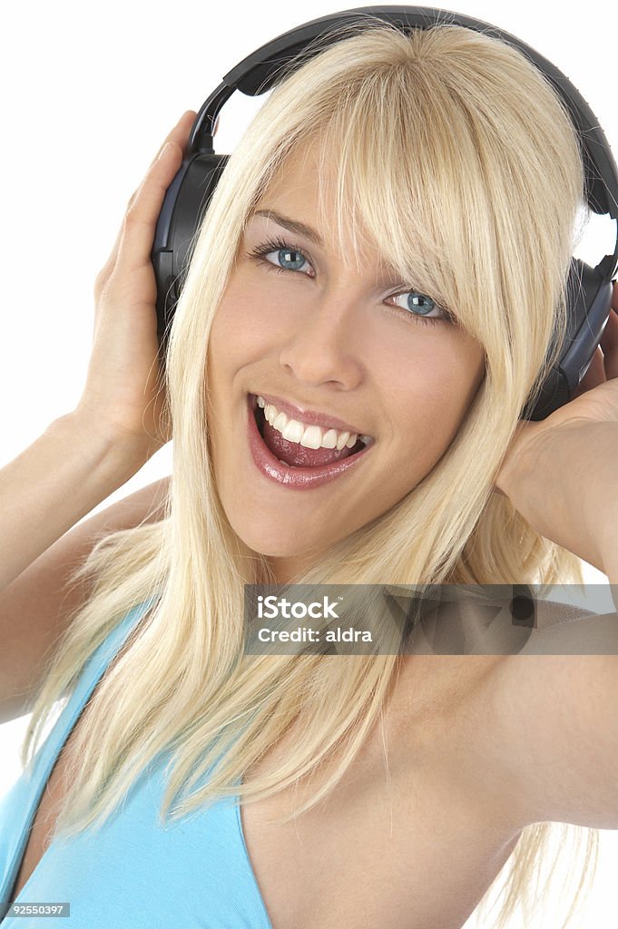 Chica con auriculares - Foto de stock de Adolescente libre de derechos