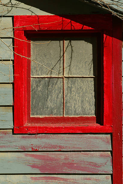 Exposto ao Ar vermelho janela - fotografia de stock