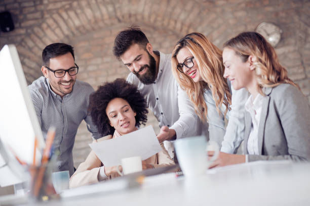 istock Group of business people working on project in modern office 925504672