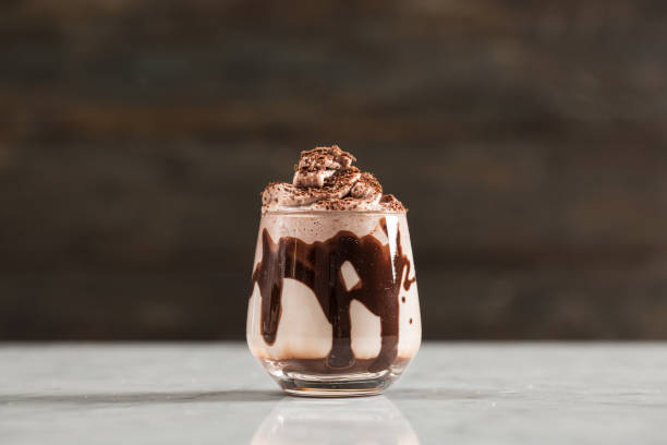istock Chocolate Milk and Whipped Cream on Wooden Background 925515624