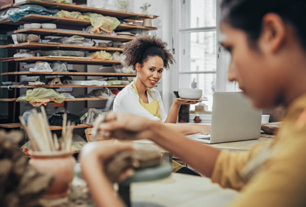 istock Close-Up Of Woman Potter Working At Table 925525280