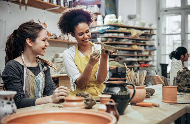 istock Female potters  in art studio 925528004