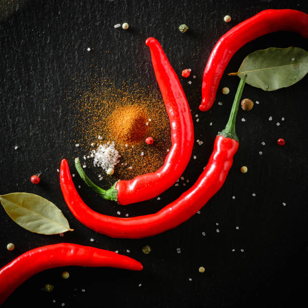 istock A composition of chili pepper. Dark stone background from slate. 925529556