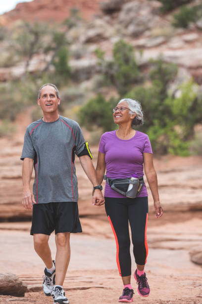 istock Senior Couple Hiking in Desert 925535212