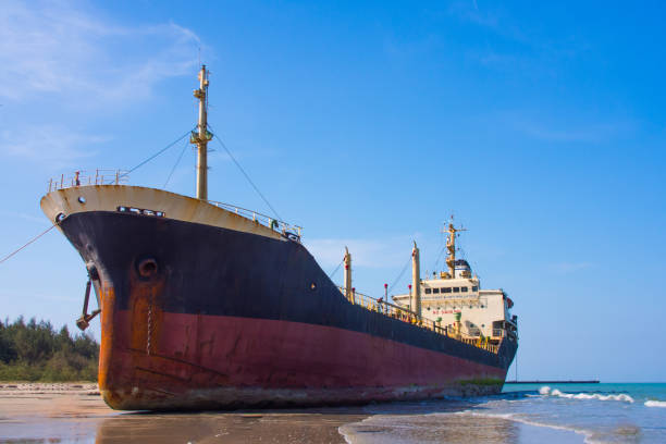 The oil tanker hit by waves crashing ashore