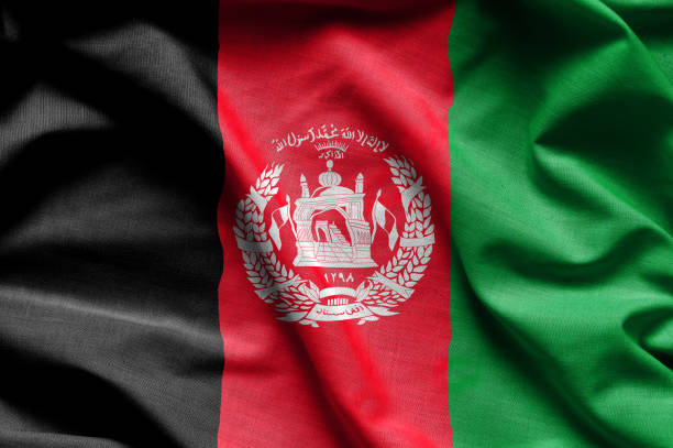 Colorful, closeup, wavy flag of Afghanistan Colorful, closeup, wavy fabric flag of Afghanistan fills the frame allegory painting photos stock pictures, royalty-free photos & images