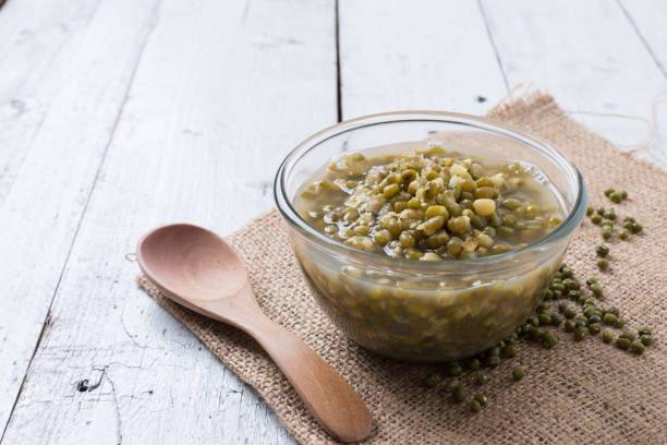 Boiled green mung beans with sugar syrup stock photo