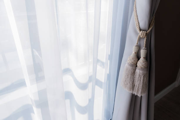 istock white Curtain with Beautiful Sun Light and Shadow 925554164
