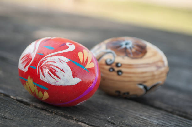 istock decorative easter eggs in outdoor on wooden table 925557672