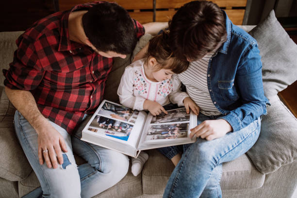 istock Taking a look at some old family photos 925560988