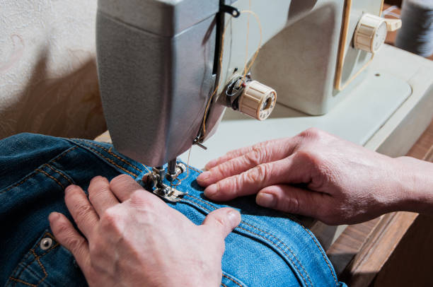 istock The elderly seamstress is working on sewing machine 925560990