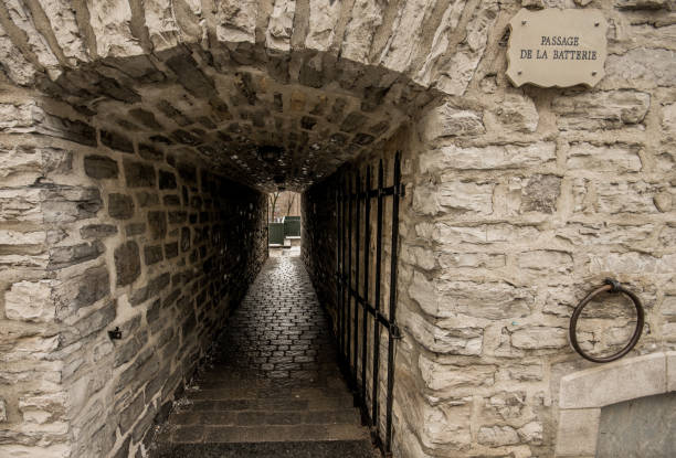 istock Old rock tunnel in downtown Quebec city, Canada 925561194