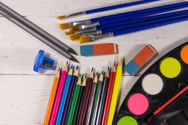istock Set of drawing tools on white wooden background 925564004