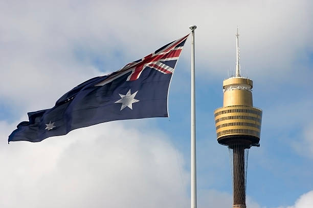 Flag and Centrepoint Tower stock photo