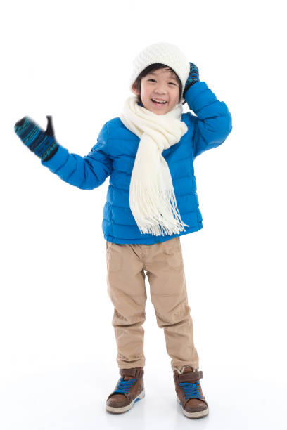 istock Happy asian child in winter clothes 925565216