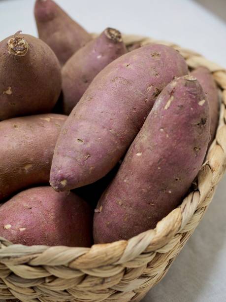 istock Sweet potatoes in a basket 925577890
