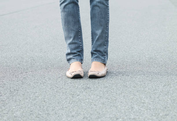 istock Woman stand alone on the road 925581632